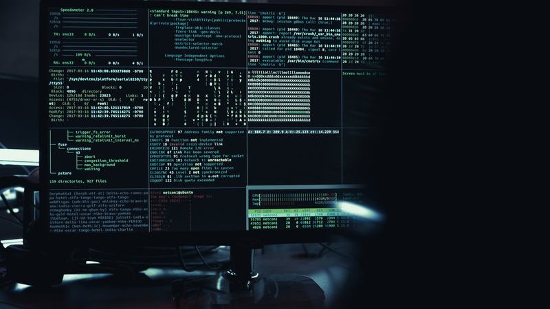 Terminal windows and system output on a monitor